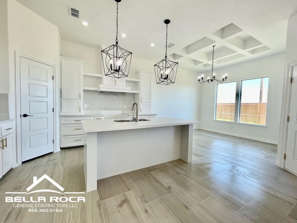 Kitchen and dining area with coffered ceiling
