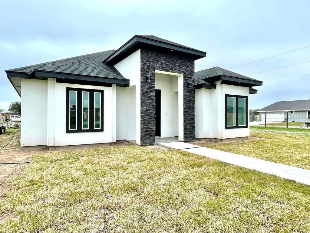 Contemporary white and black stucco home